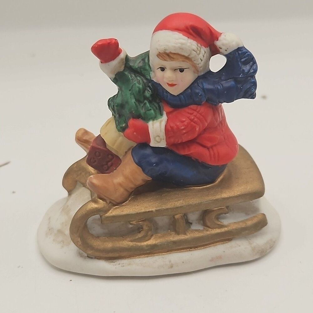 Vintage Russ Berrie & Co. Waving Child on Sleigh with Tree
